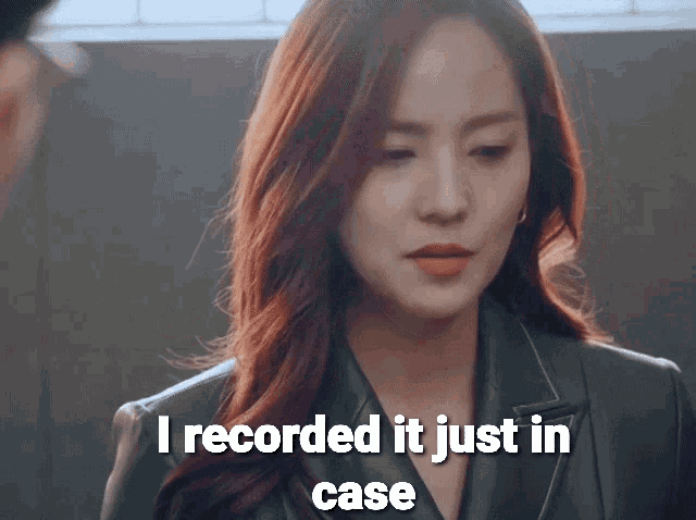 a woman in a black jacket says " i recorded it just in case "