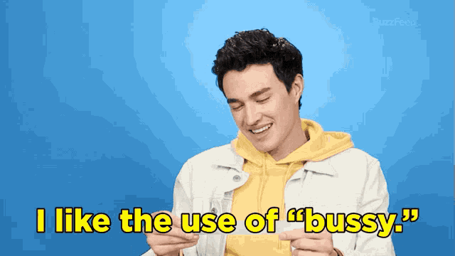a man in a yellow hoodie says " i like the use of " pussy "