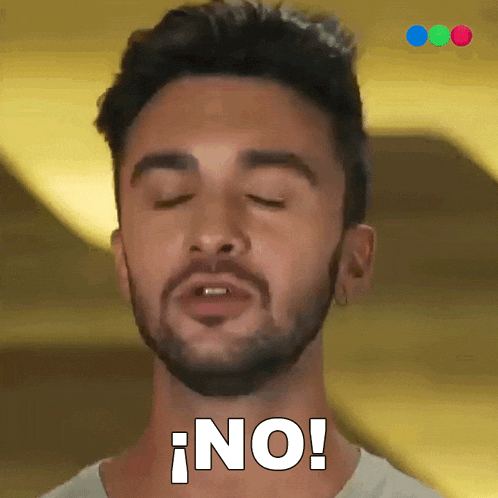 a man with a beard is making a face and says no