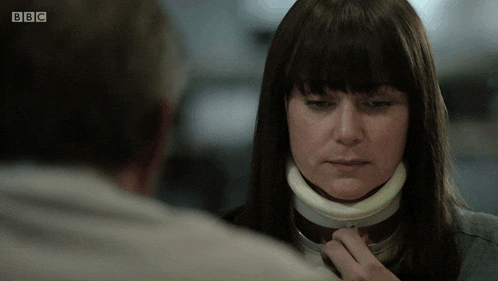 a woman with a collar around her neck is on bbc
