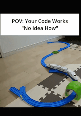 a picture of a toy train track that says " your code works "