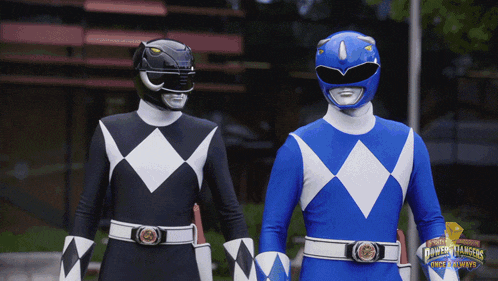 two power rangers are standing next to each other and their uniforms say the power rangers movie archives