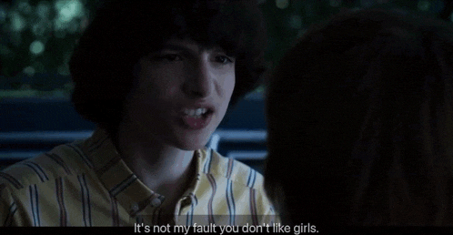 a man in a striped shirt says it 's not my fault you don t like girls