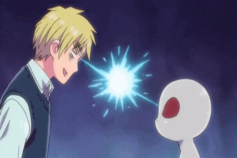 a man is standing next to a white alien with a red eye and a blue light coming out of his eyes .