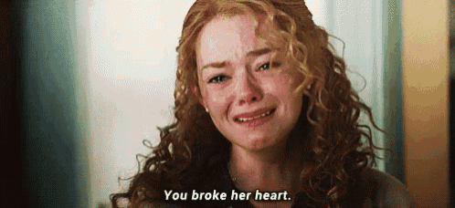 a woman with curly hair is crying and says `` you broke her heart '' .