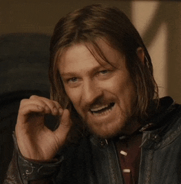 a man with long hair and a beard wearing a leather jacket