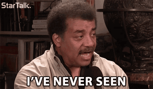a man says " i 've never seen " while talking into a microphone
