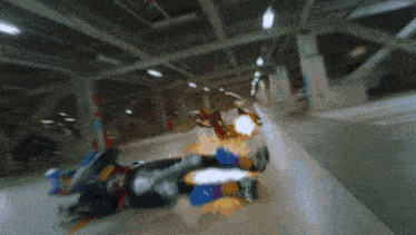 a blurred image of a person laying on the floor