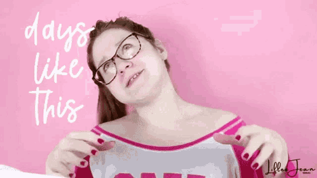 a woman wearing glasses and a pink shirt with the words days like this on the bottom