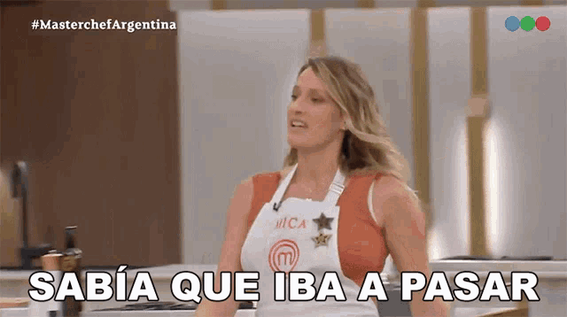 a woman wearing an apron that says mica on it
