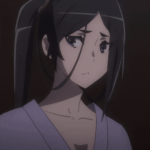 a girl with long black hair and a ponytail