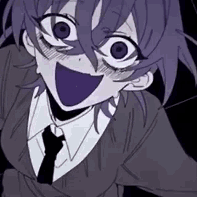 a close up of a cartoon character wearing a suit and tie with a big smile on his face .
