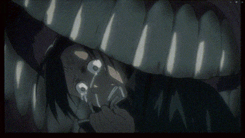 a close up of a person 's face with tears coming out of his eyes