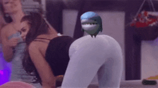 a shark is sitting on a woman 's butt in a video game .
