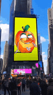 a large billboard with a cartoon apple on it that says " eat me "