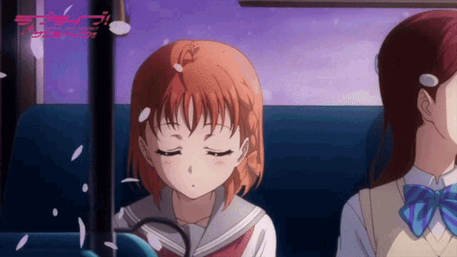 a girl in a school uniform sits next to another girl on a bus with petals falling from her hair