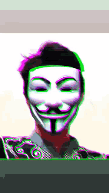 a man wearing a anonymous mask with green and purple highlights