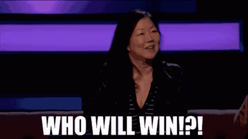 a woman sitting on a couch with the words who will win !