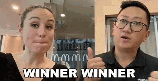a man giving a thumbs up next to a woman with the words winner winner written below them