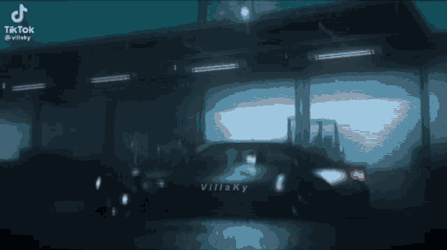 a villaky car is parked in a garage
