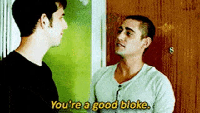 two men are standing next to each other and one of them says you 're a good bloke