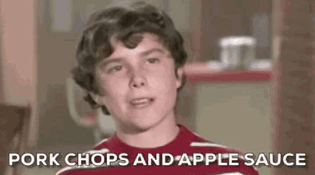 a young man is talking about pork chops and apple sauce .