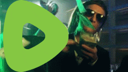 a man in sunglasses is holding a bag of money