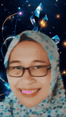 a woman wearing glasses and a hijab is smiling with the word kerenan on her mouth