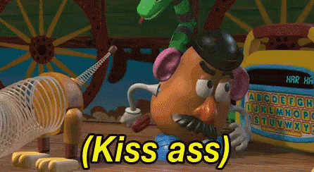 a mr potato head from toy story is kissing a slinky toy