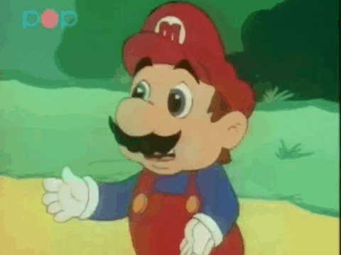 a close up of a cartoon character with a red hat with the letter m on it