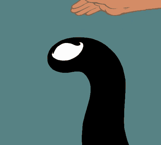 a hand is touching a black object with a white swirl on it