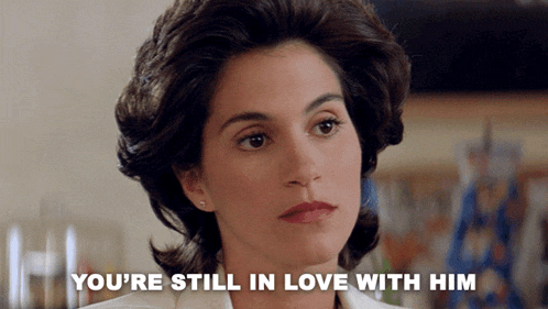 a woman says " you 're still in love with him " in front of her