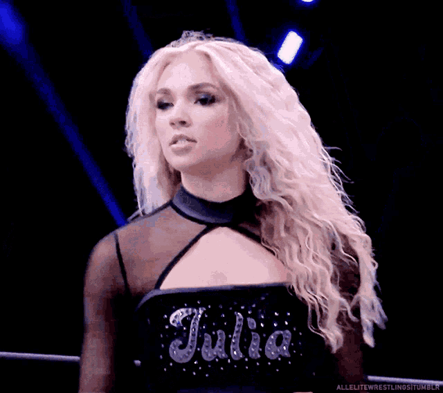 a woman in a black dress with the word julia on it