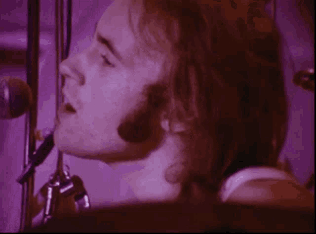 Phil Collins Licking Lips GIF - Phil Collins Licking Lips Woo Woo Woo GIFs