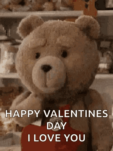 a teddy bear is holding a heart and saying happy valentine 's day i love you