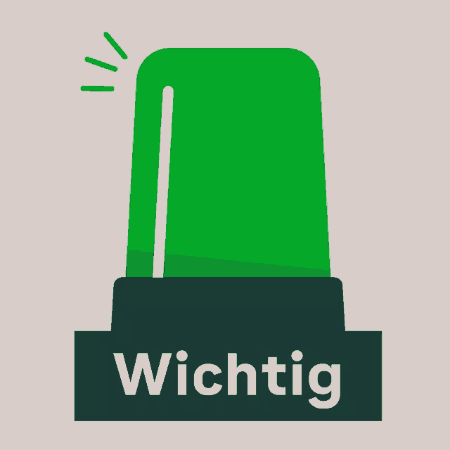 a green warning light with the word wichtig underneath it