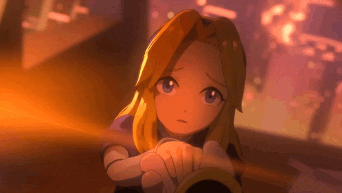 a girl with blonde hair and blue eyes is holding something