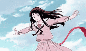 a girl in a school uniform is flying through the air .