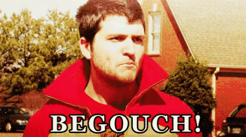 a man in a red jacket says begough in front of a house