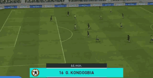 a soccer game is being played on a green field
