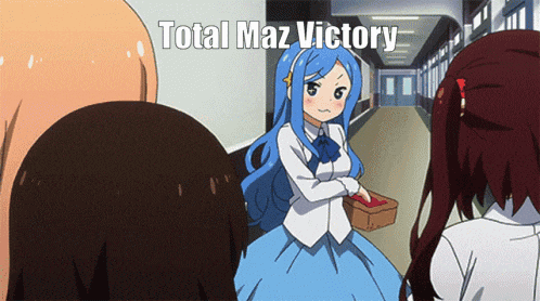 a girl in a blue dress stands in a hallway with the words total maz victory written above her