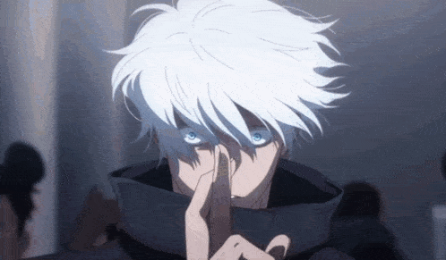 a man with white hair and blue eyes is holding his finger to his mouth