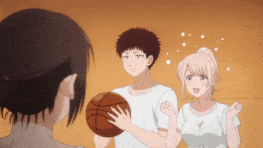 a man is holding a basketball while a woman watches