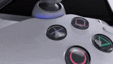 a close up of a video game controller showing the buttons x o and y