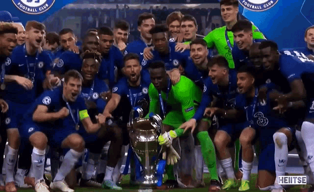 a group of soccer players are posing for a picture with a trophy that says heitse