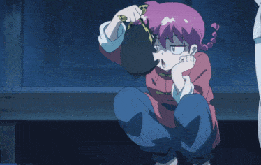 a girl with pink hair is kneeling down with her hands on her face