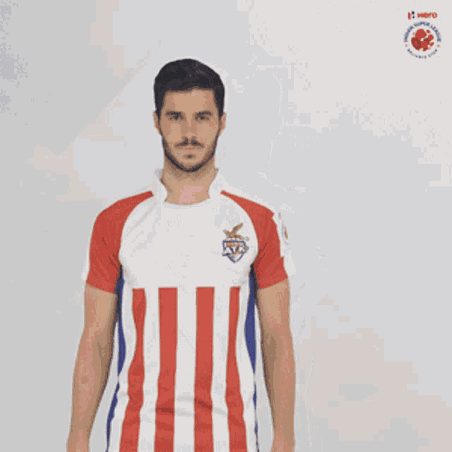 a man in a red white and blue jersey with the number 10 on it