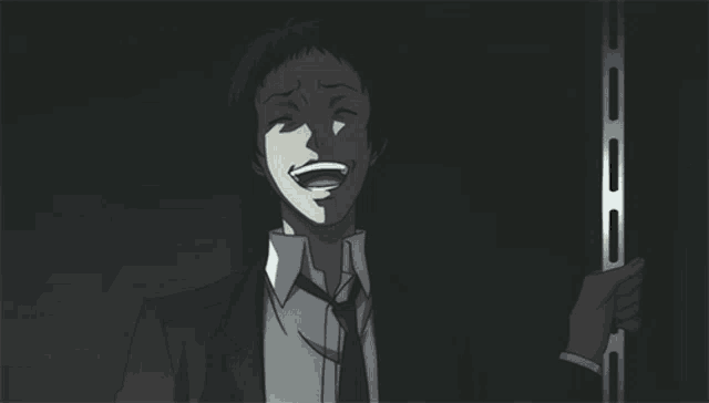 a man in a suit and tie is smiling and holding a metal pole