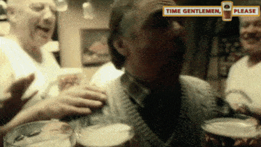 a man is holding a glass of beer with a sign that says time gentlemen please