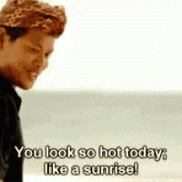 a man is standing on a beach and says you look so hot today like a sunrise